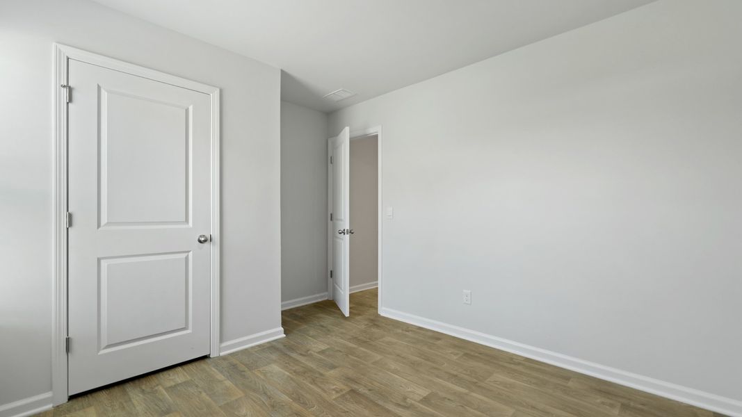 Spacious, unfurnished interior of a new home in Pine Hills at Cane Bay, Summerville (Image 17).