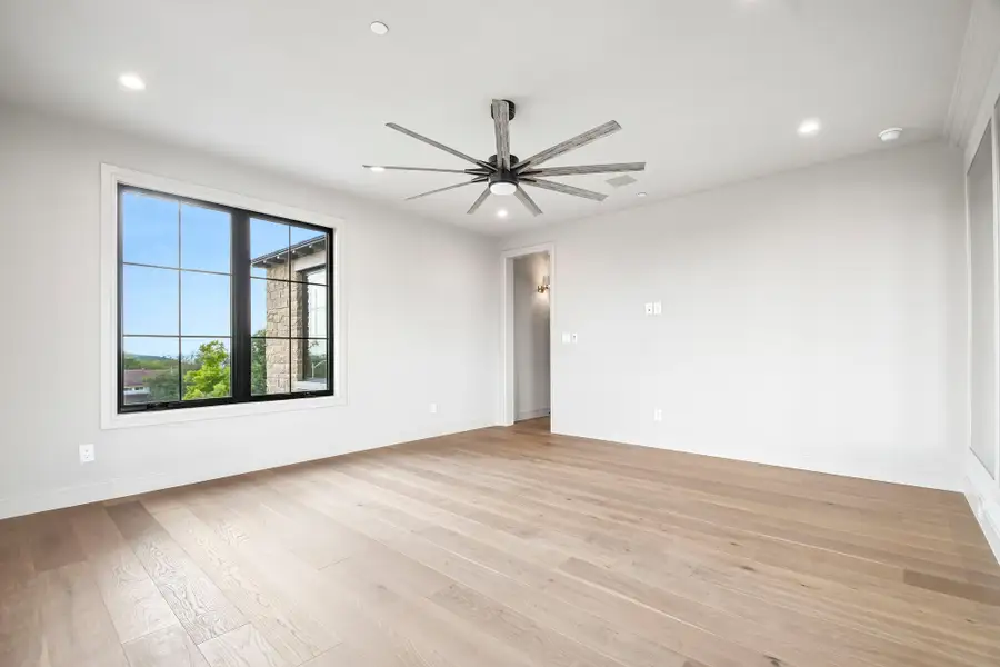 Spacious, unfurnished interior of a new home in The Overlook at Westlake, Austin (Image 23).