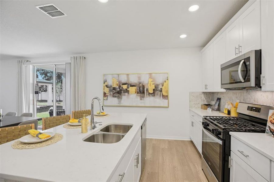 Furnished interior view inside a new home in Fox Pointe at Rivers Edge, Leesburg (Image 14).