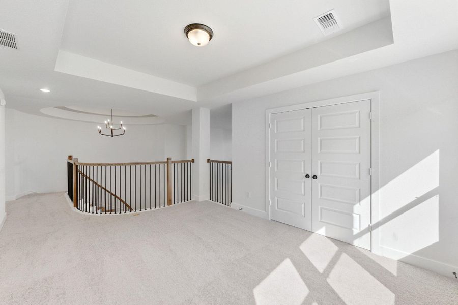 Spacious, unfurnished interior of a new home in The Colony, Bastrop (Image 28).