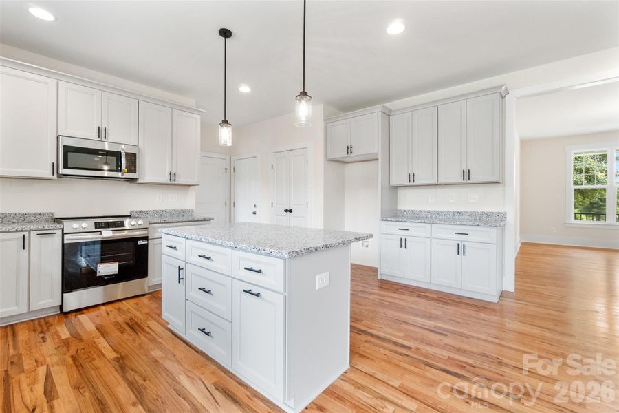 Furnished interior view inside a new home in , Concord (Image 10).