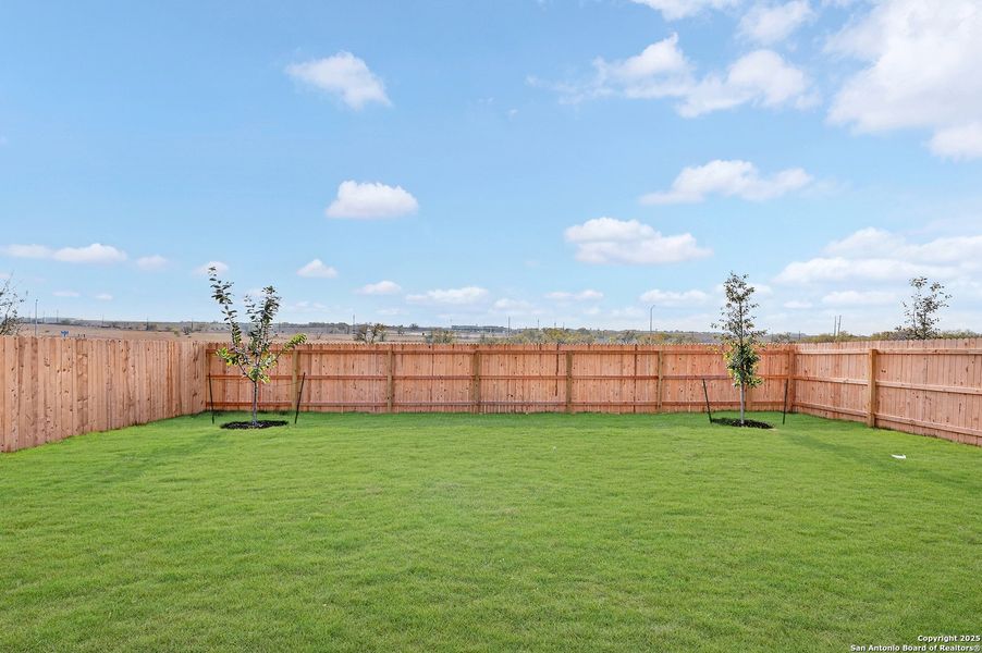 Exterior details and patio area of a home in Paloma Park, Converse (Image 24).