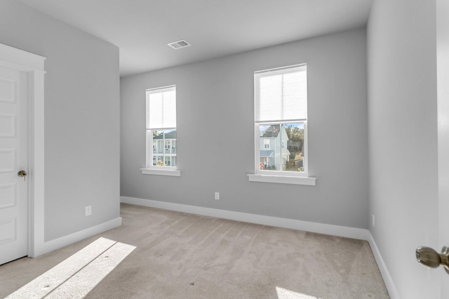 Spacious, unfurnished interior of a new home in Carnes Crossroads: Row Collection, Summerville (Image 13). Spacious, unfurnished interior of a new home in Carnes Crossroads: Row Collection, Summerville (Image 13).
