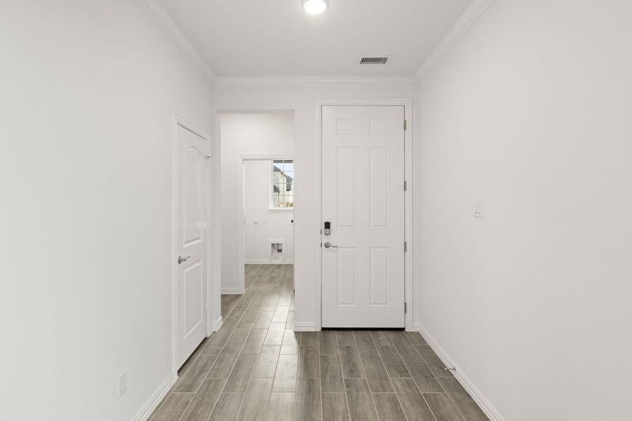 Representative unfurnished interior of a home built from the Blackburn by UnionMain Homes in Reunion, Rhome (Image 11).