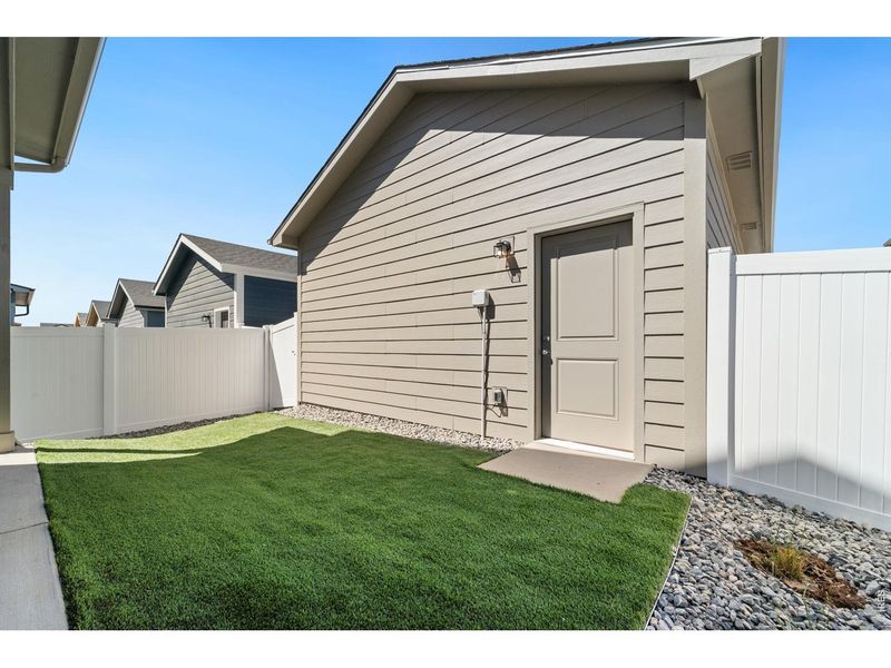 Exterior details and patio area of a home in Liberty Draw, Evans (Image 3).