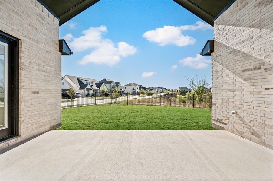 Exterior details and patio area of a home in Parks of Aledo, Aledo (Image 23).