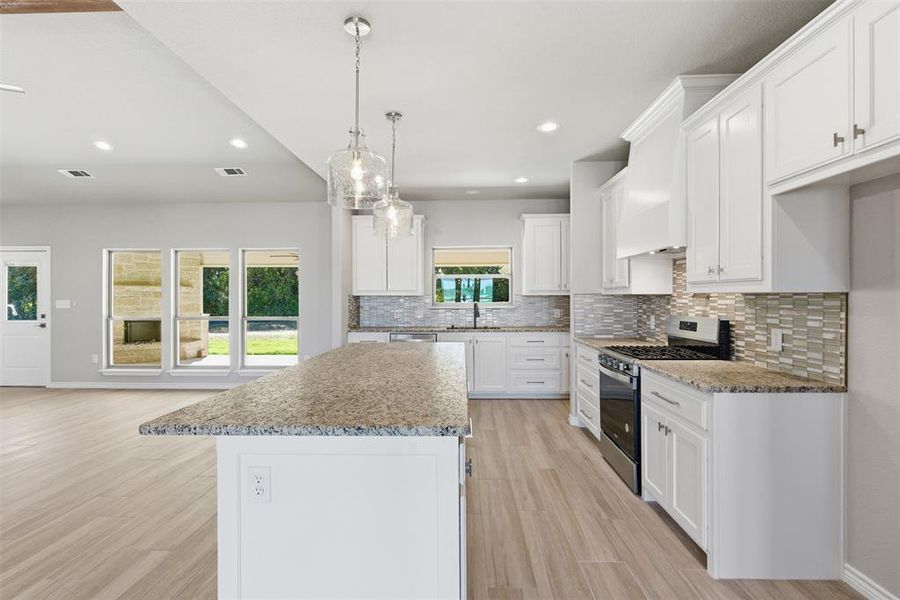 Kitchen window looks out to back porch Kitchen window looks out to back porch