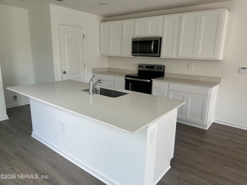 Furnished interior view inside a new home in Rookery, Green Cove Springs (Image 5).