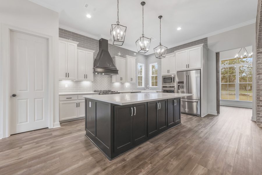 Representative furnished interior of a home built from the The Lafitte by Manuel Builders in Chapel Bend, Montgomery (Image 6).
