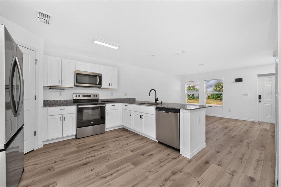 Furnished interior view inside a new home in , Port Charlotte (Image 6).