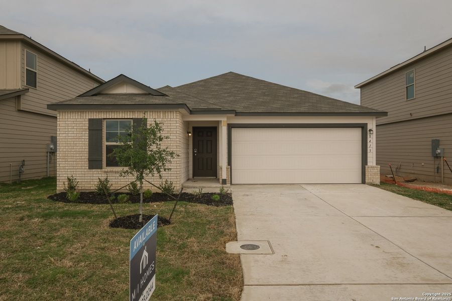 Front exterior of a new home in Agave, San Antonio, TX, highlighting curb appeal (Image 5).