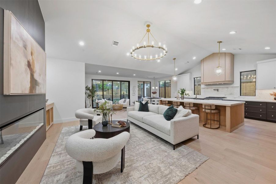 Spacious open-concept living area creates an effortless flow between the kitchen, dining, and family room.