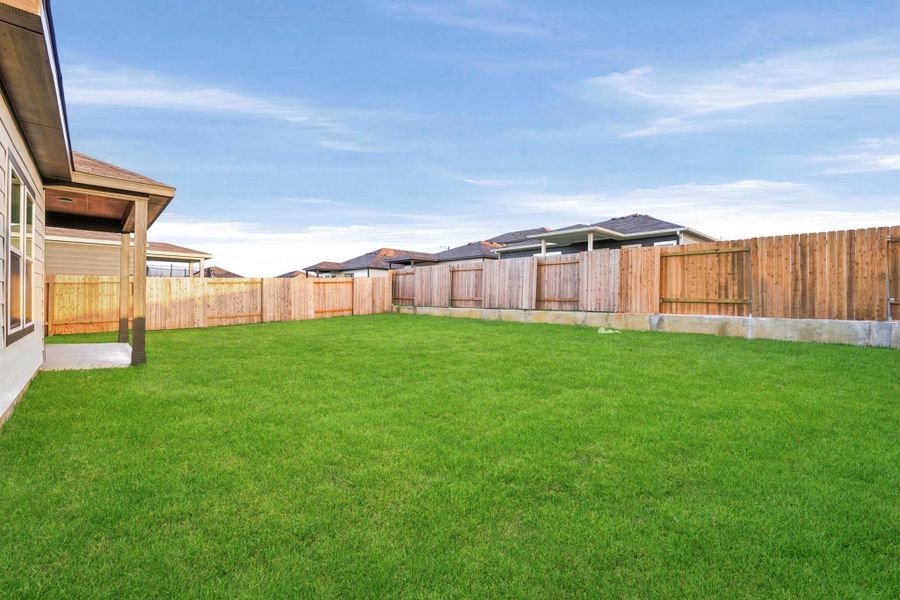 Exterior details and patio area of a home in Reveille Estates, Bryan (Image 4).