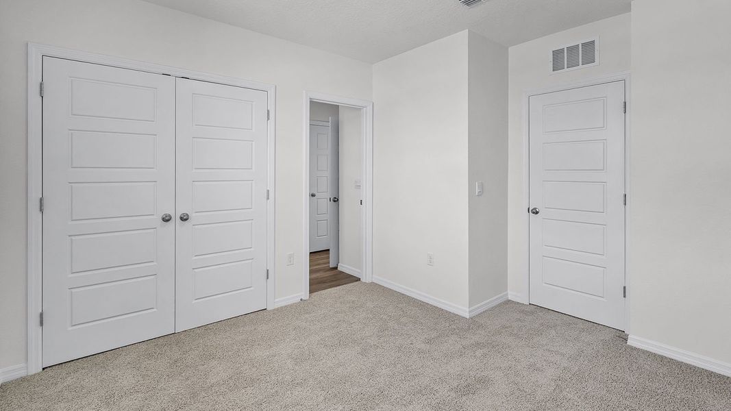 Representative unfurnished interior of a home built from the VALE by D.R. Horton in Harmony at Lake Eloise, Winter Haven (Image 27).