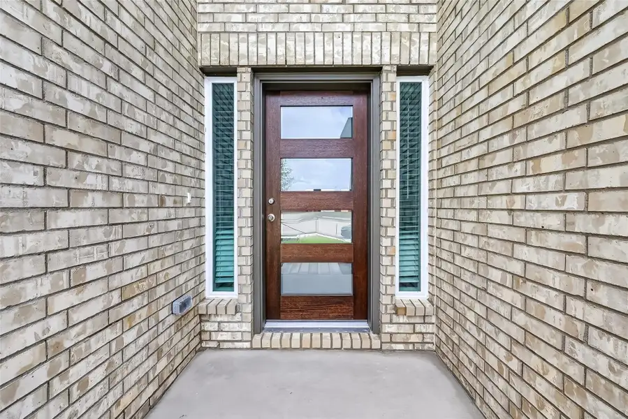 Exterior details and patio area of a home in Grand Magnolia, Magnolia (Image 3). Exterior details and patio area of a home in Grand Magnolia, Magnolia (Image 3).