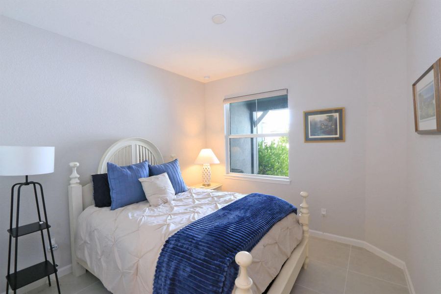 Furnished interior view inside a new home in Del Webb Tradition, Port St. Lucie (Image 28).