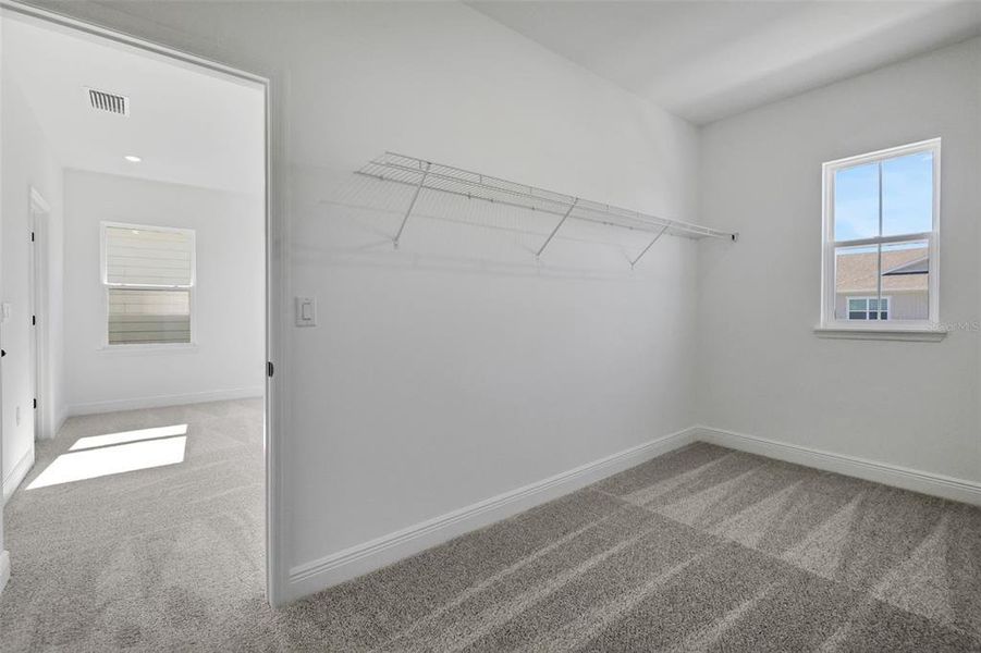 Spacious, unfurnished interior of a new home in Serenade at Ovation, Winter Garden (Image 35). Spacious, unfurnished interior of a new home in Serenade at Ovation, Winter Garden (Image 35).