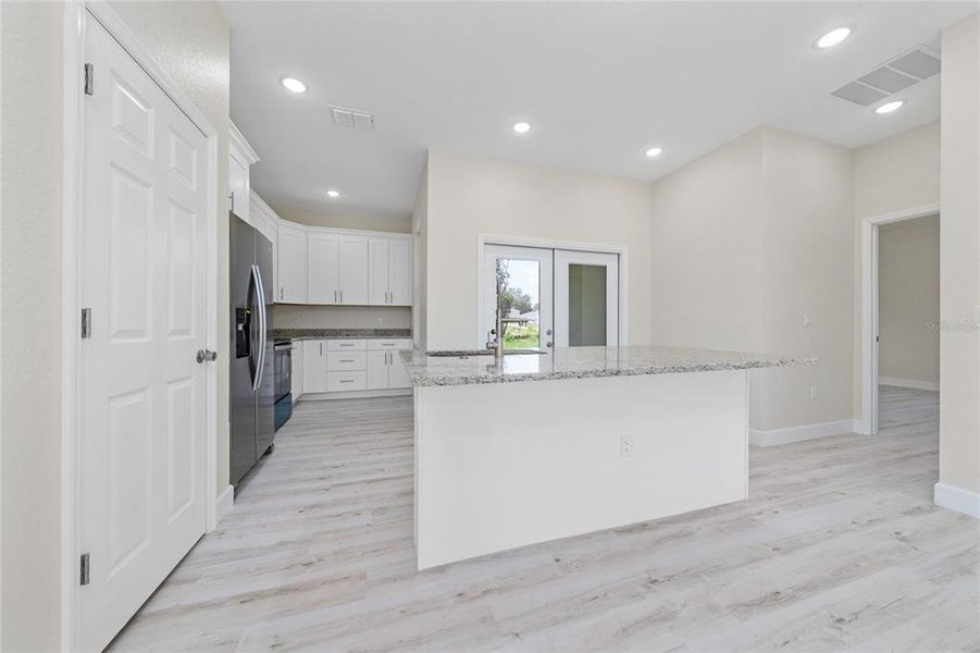 Furnished interior view inside a new home in , Kissimmee (Image 6).
