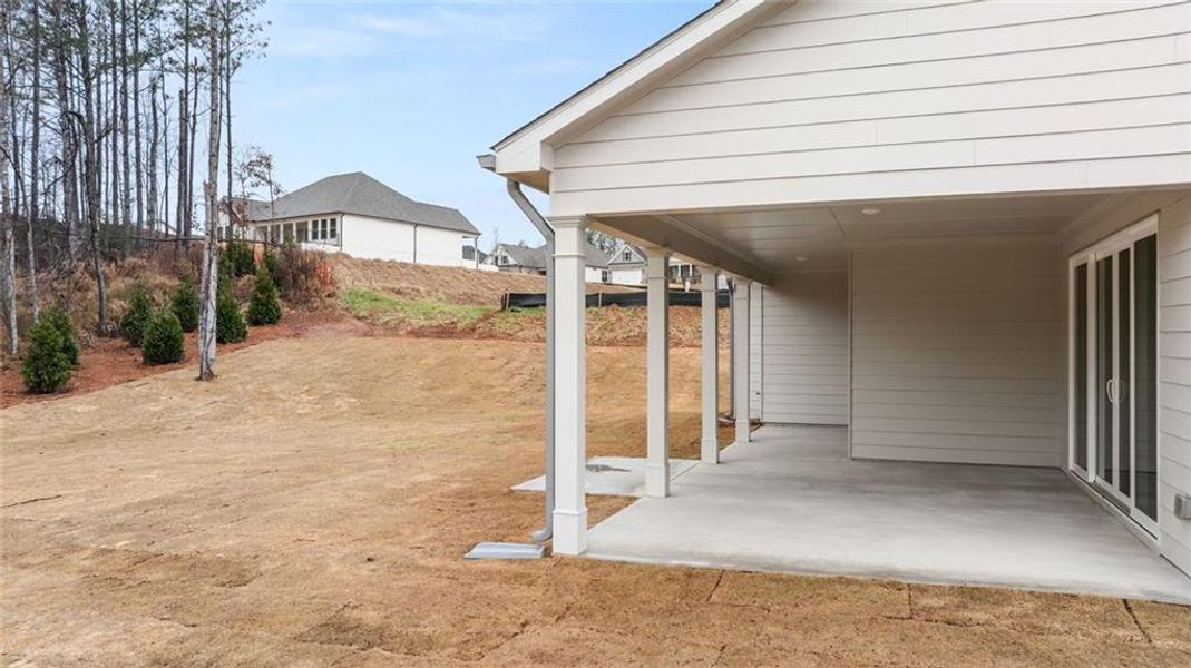 Exterior details and patio area of a home in Soleil Belmont Park, Canton (Image 28).