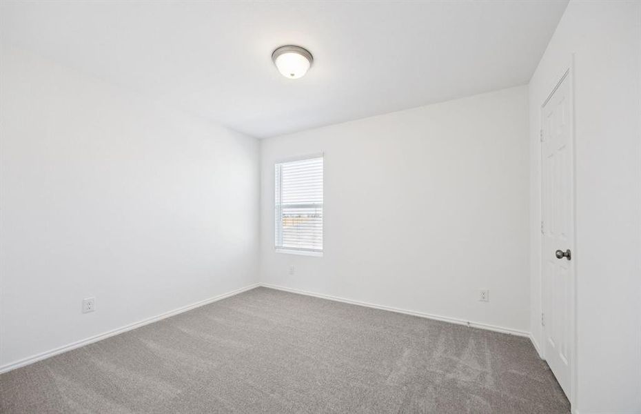 Secondary bedroom designed for comfort and convenience Secondary bedroom designed for comfort and convenience