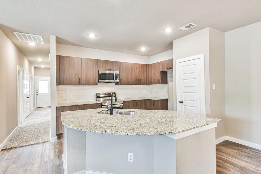 Furnished interior view inside a new home in Enclave At Dobbin, Magnolia (Image 11).