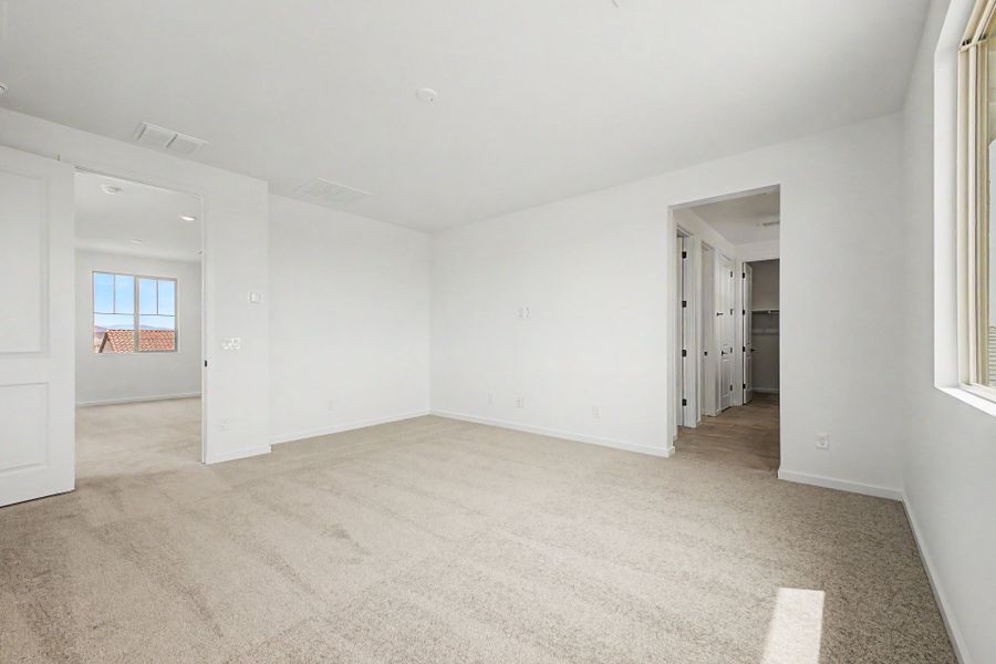 Spacious, unfurnished interior of a new home in Mason Ranch II, Surprise (Image 9).