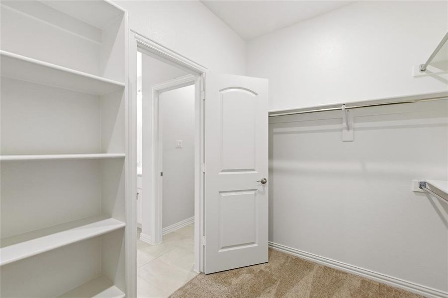 Primary bedroom closet.