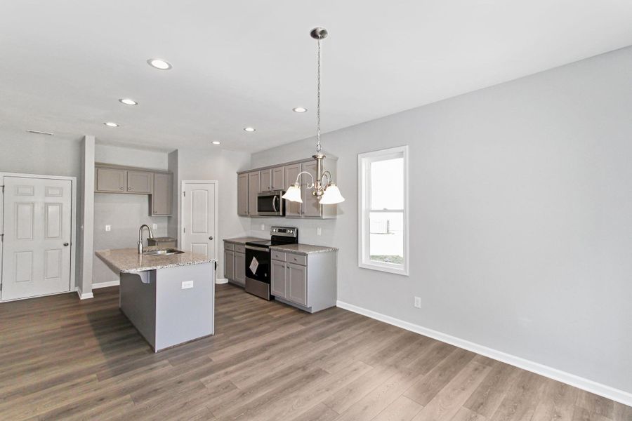 Representative furnished interior of a home built from the Nicklaus by RiverWILD Homes in Riverwood Ranch, Clayton (Image 12).