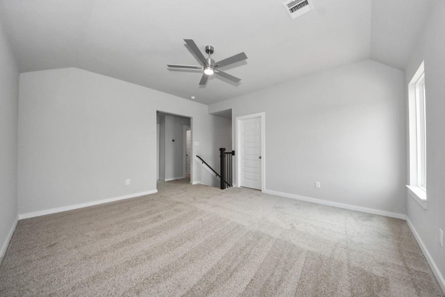 Take another look at the spacious game room. Sample photo of completed home with similar floor plan. Actual colors and selections may vary.