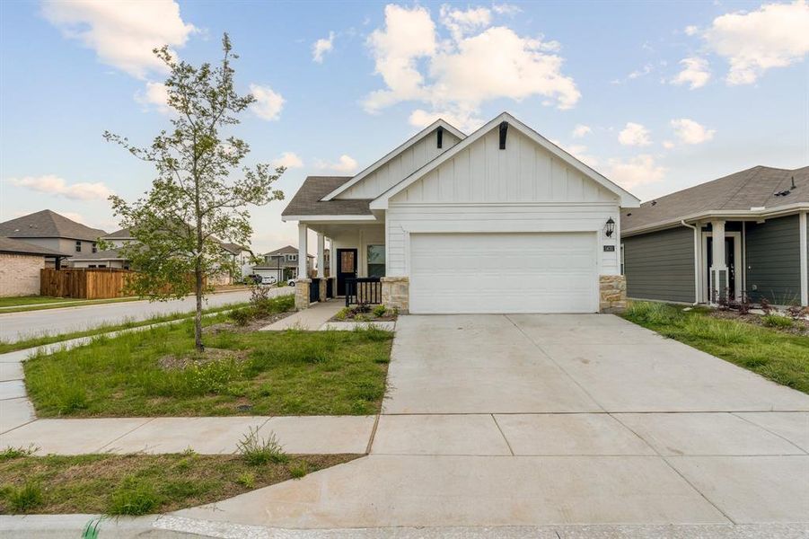 Craftsman inspired home featuring a garage