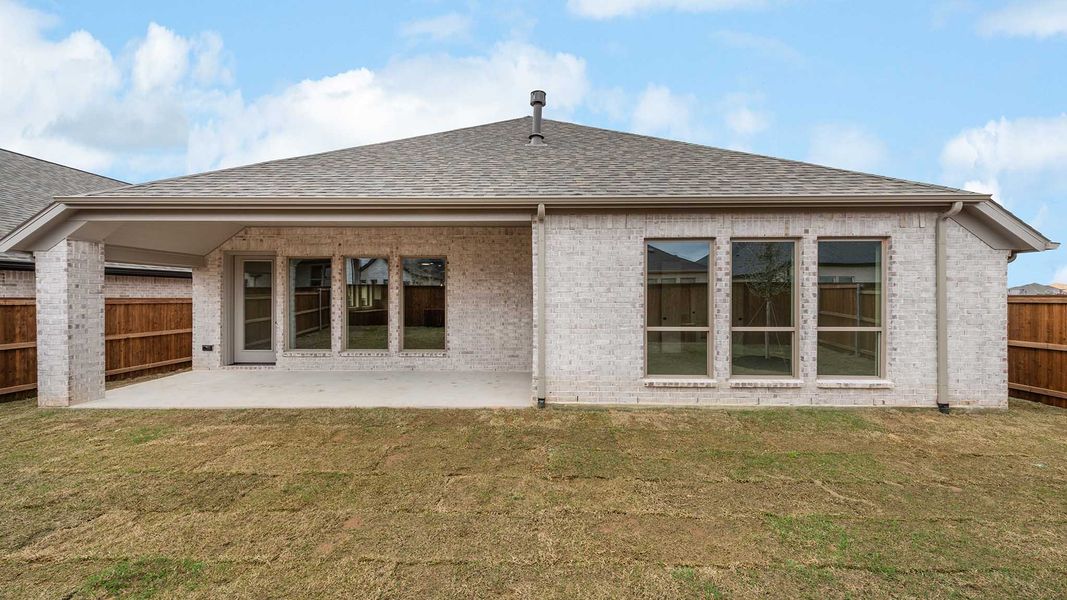 Exterior details and patio area of a home in Cambridge Crossing, Celina (Image 32).