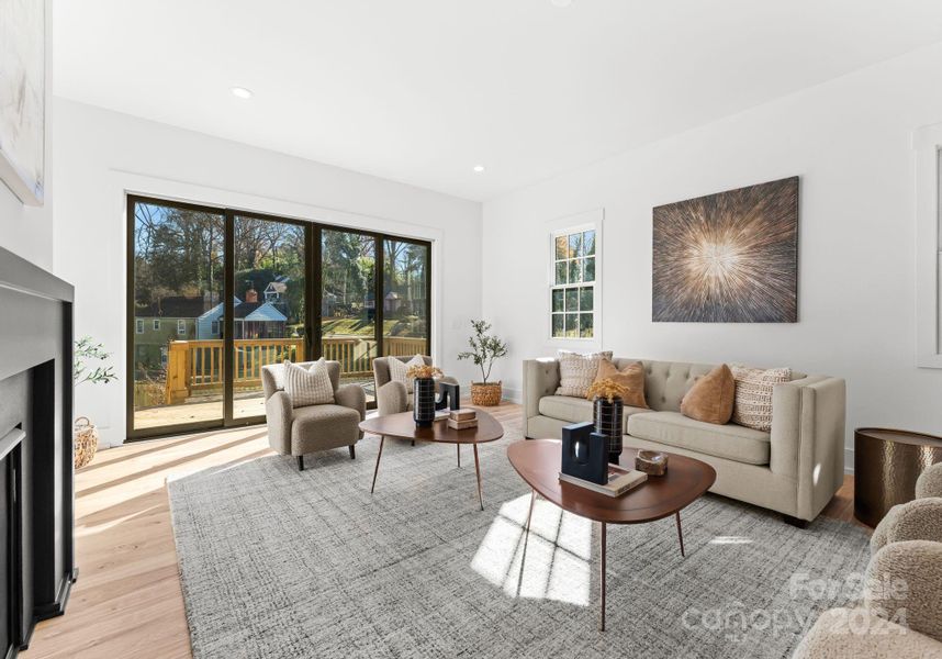 Glass sliding doors opening to the backyard