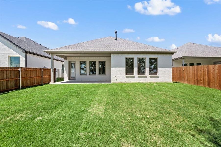 Exterior details and patio area of a home in Parks of Aledo, Aledo (Image 21).