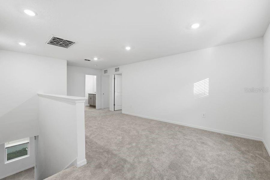 Spacious, unfurnished interior of a new home in Palm Wind, Hudson (Image 22).