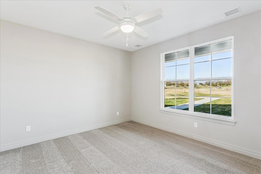Spacious, unfurnished interior of a new home in The Courtyards at Jacobs Farm, Wichita (Image 18).