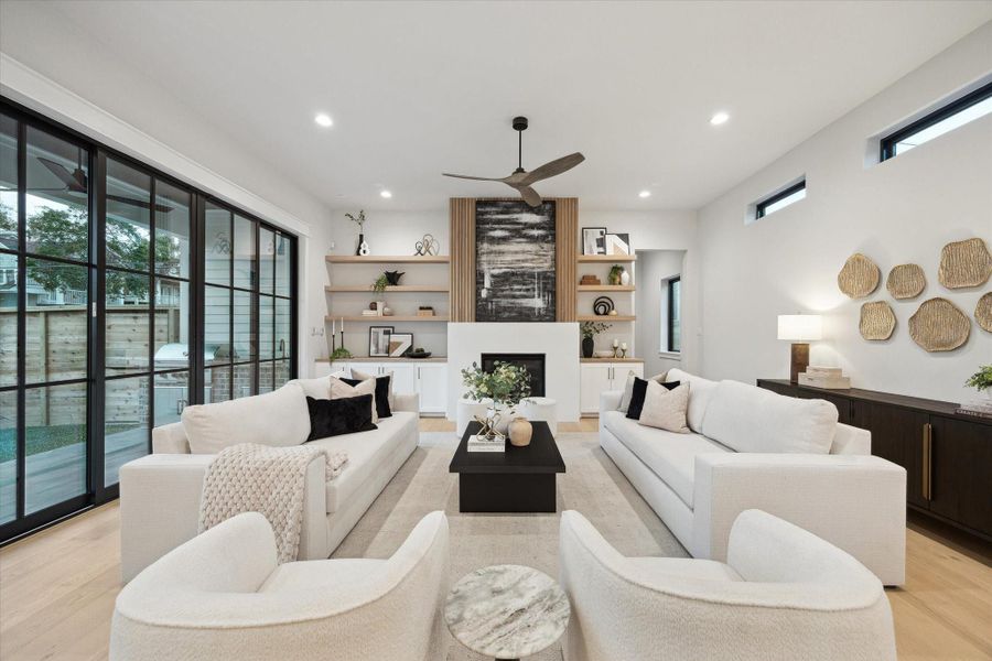 Access the outdoor living through the window wall on the left.