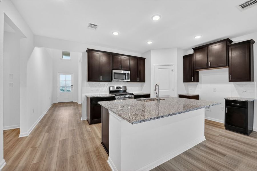 Furnished interior view inside a new home in Lisso, Pflugerville (Image 6).
