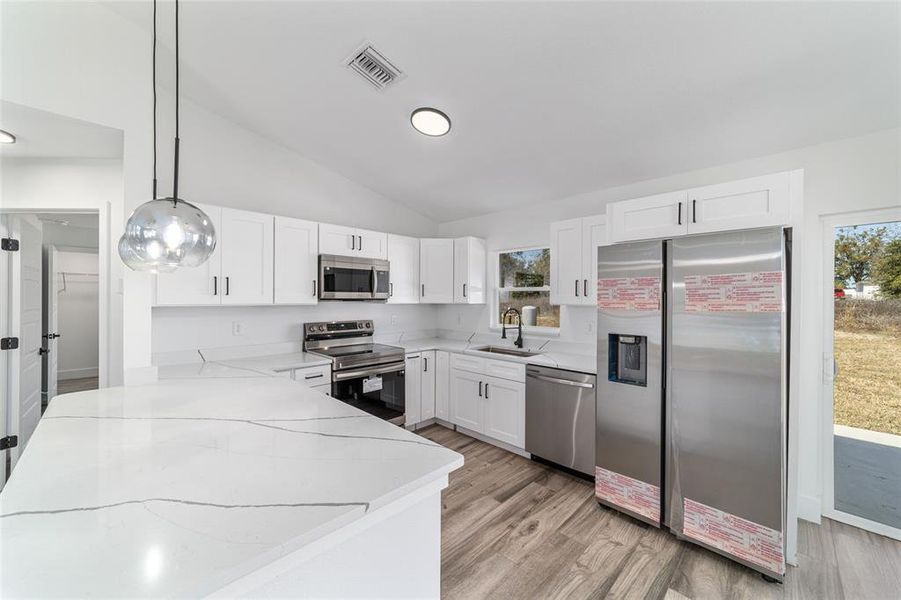 Furnished interior view inside a new home in , Dunnellon (Image 6).