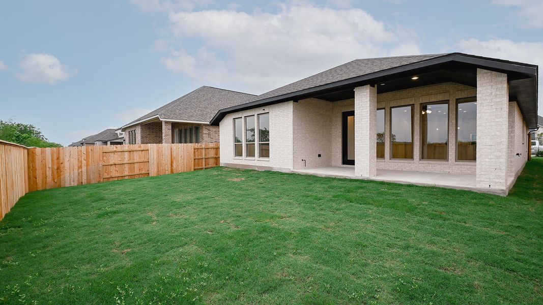 Exterior details and patio area of a home in Crosswinds, Kyle (Image 3).