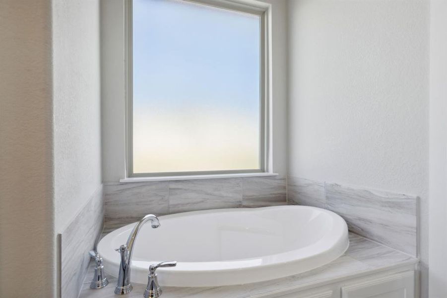 Bathroom featuring plenty of natural light