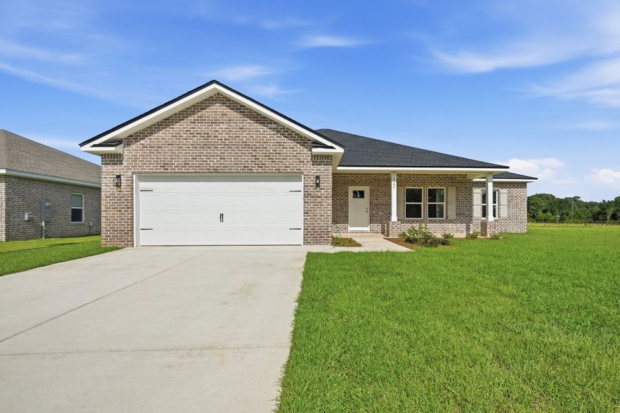 Front exterior of a new home in Southern Charm, Crestview, FL, highlighting curb appeal (Image 1). Front exterior of a new home in Southern Charm, Crestview, FL, highlighting curb appeal (Image 1).