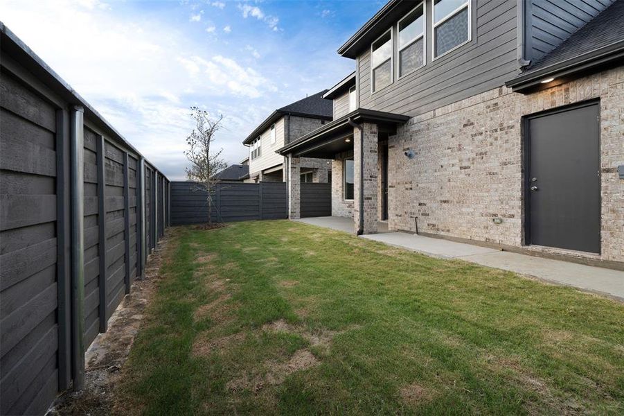 View of yard with a patio