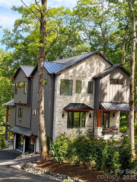 Front exterior of a new home in , Boone, NC, highlighting curb appeal (Image 24).