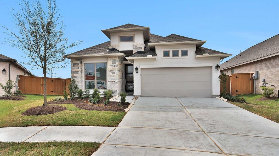 Front exterior of a new home in Marvida, Cypress, TX, highlighting curb appeal (Image 2).