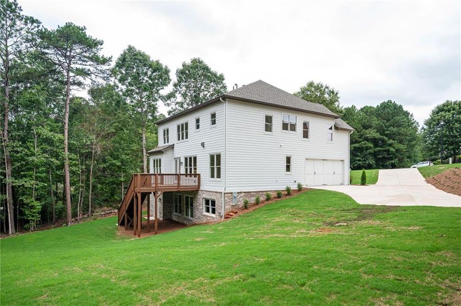 Front exterior of a new home in , Monroe, GA, highlighting curb appeal (Image 29). Front exterior of a new home in , Monroe, GA, highlighting curb appeal (Image 29).