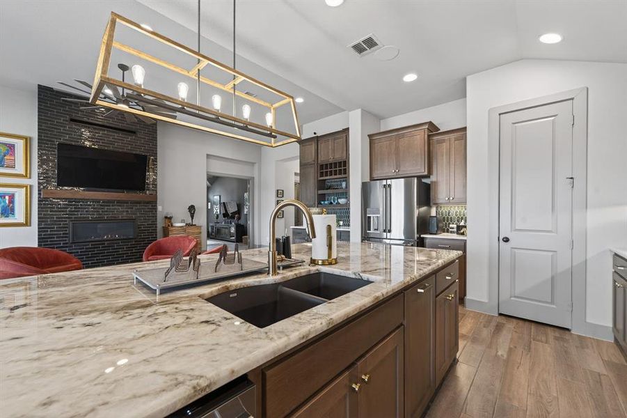 Beautiful open-concept kitchen with expansive island seating. Beautiful open-concept kitchen with expansive island seating.