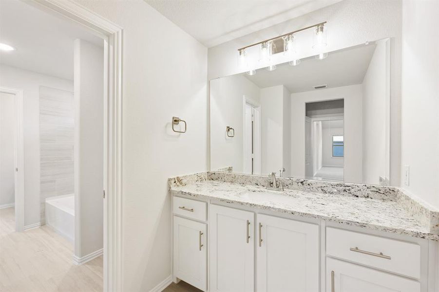 Furnished interior view inside a new home in Union Park Classic 60, Little Elm (Image 13). Furnished interior view inside a new home in Union Park Classic 60, Little Elm (Image 13).