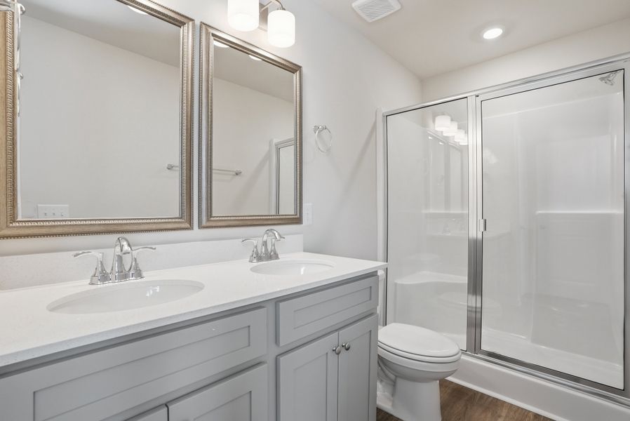 Representative furnished interior of a home built from the Aspen 3 Exterior by McGuinn Homes in Liberty Village, Hinesville (Image 28).