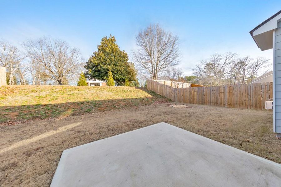 Exterior details and patio area of a home in Old Lost Mountain Estates, Powder Springs (Image 27).