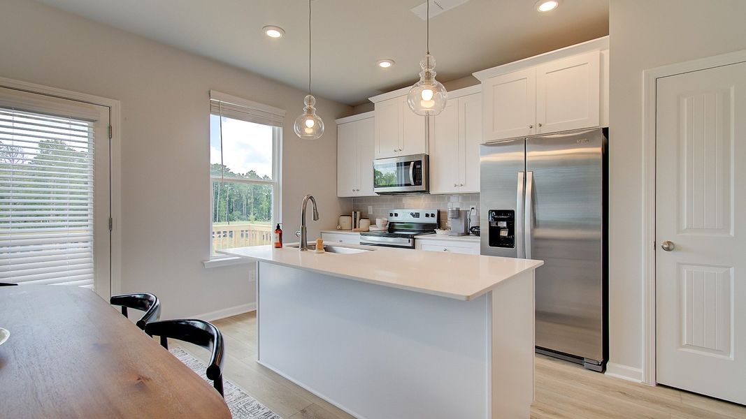 Representative furnished interior of a home built from the Layla II by DRB Homes in Towne Center, Hampton (Image 7).